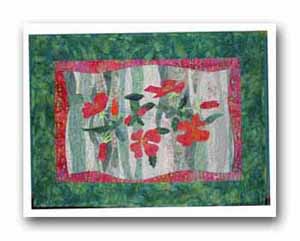 Working in a series I experiments with using tulle to soften the greens in the background so the leaves would be more visible.